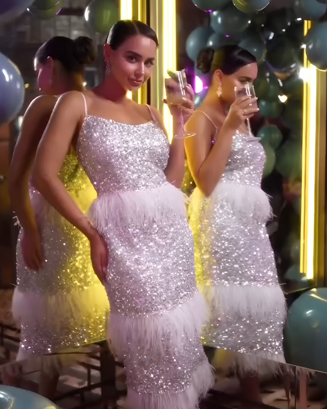 Arushi Mehra in Naomi White Fringe Gown